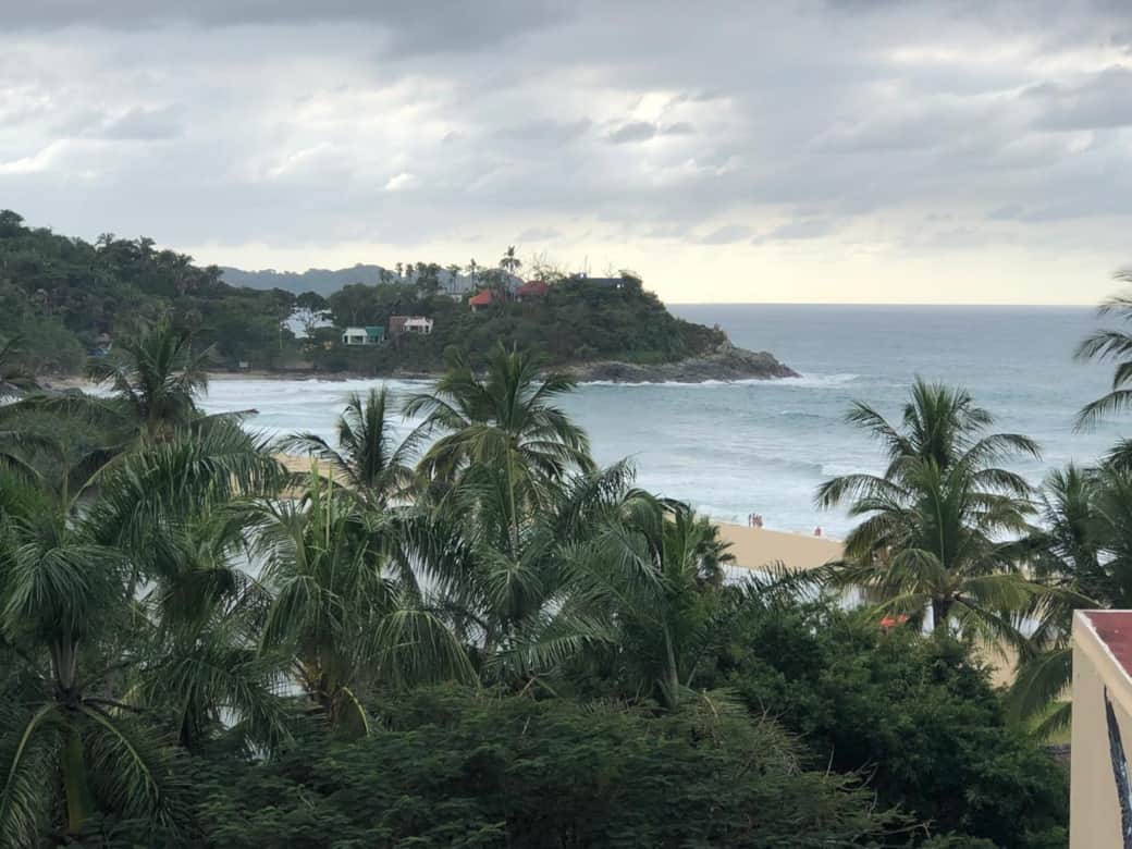 Wake up to endless jungle and ocean horizons.