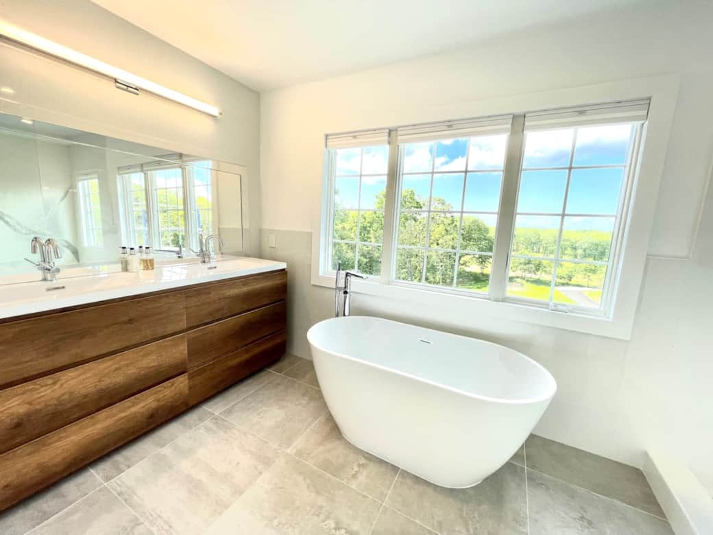 The Treetop bedroom's bath w double sink and views galore
