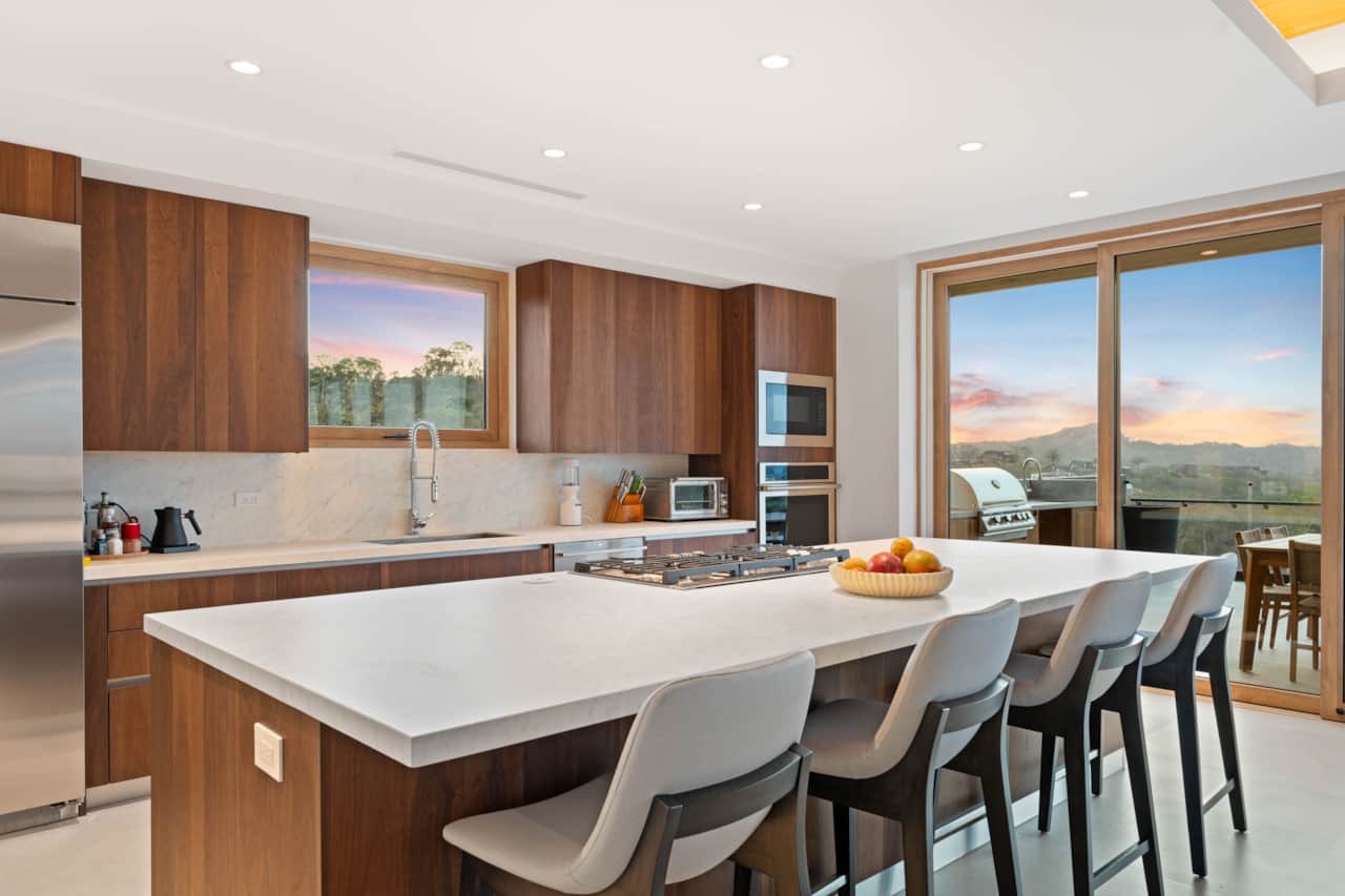 Modern kitchen with ocean-view dining area