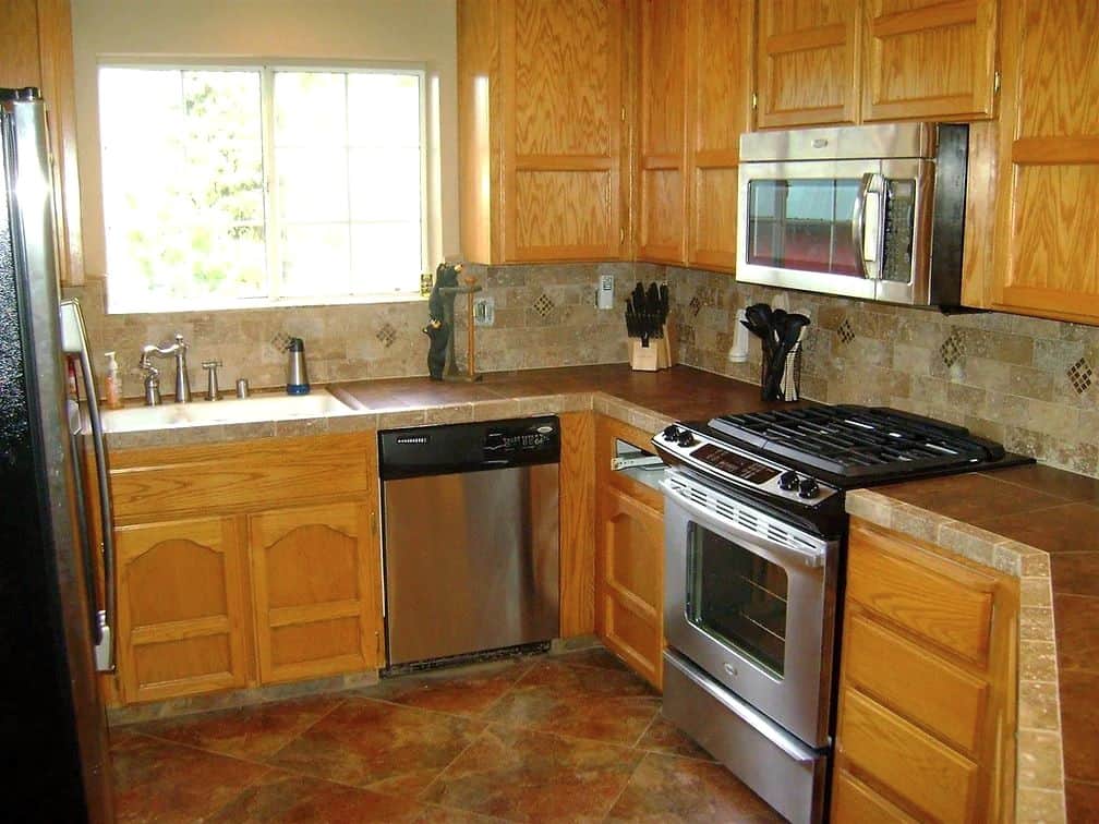 Full kitchen with cooking essentials provided