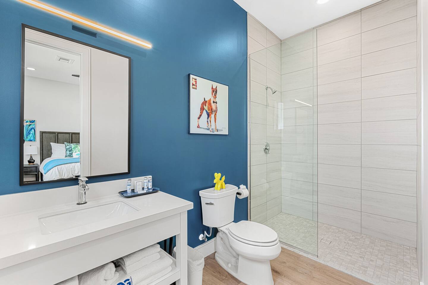 Ample bathroom 1 with a walk-in shower, perfect for a fresh shower.