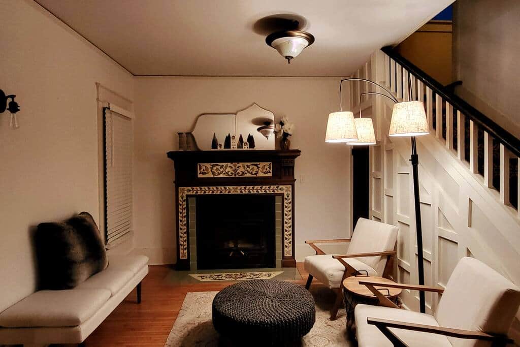 Seating area off the main living room with fireplace.
