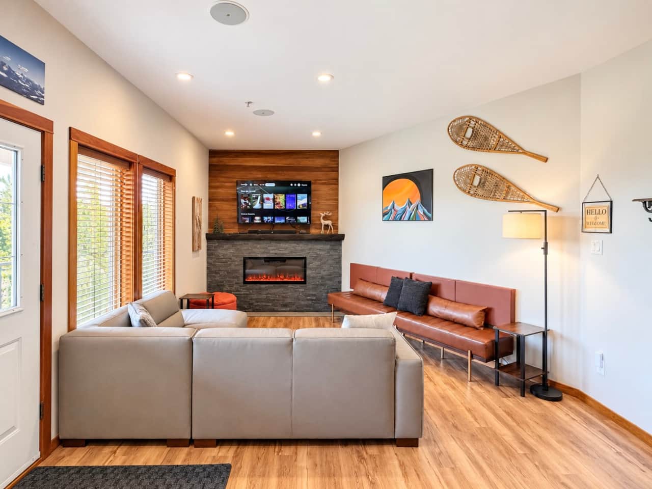 NEW Teak and Stone Fireplace and Brand New Leather Furniture