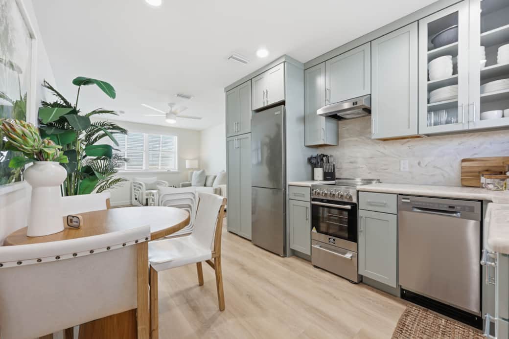 Full kitchen and eating area to enjoy after a long day at the beach Full kitchen and eating area to enjoy after a long day at the beach