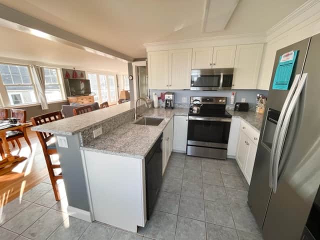 Kitchen with seating at the bar