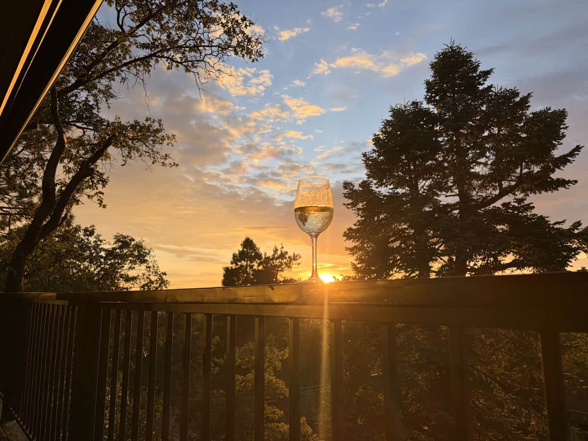 1 of 3 private decks at SHL - this one sits off the family room and looks over the treetops toward the sunset. It's the go-to spot for golden-hour wine, morning coffee, or leaning on the rail and watching the sky change color over the mountains.