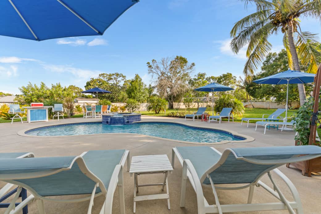 Escape the sun and lounge underneath the large umbrellas.