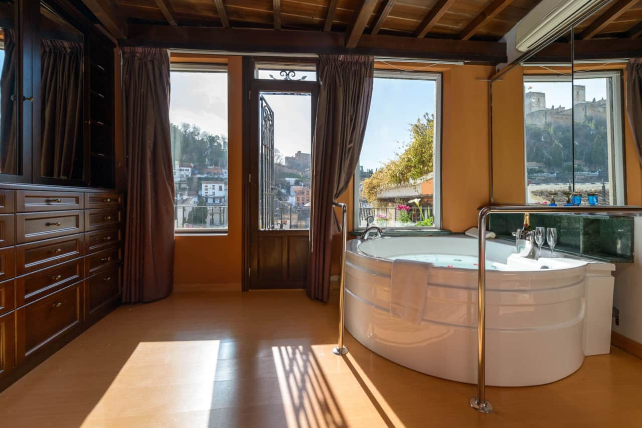 Master bedroom with jacuzzi with Alhambra views