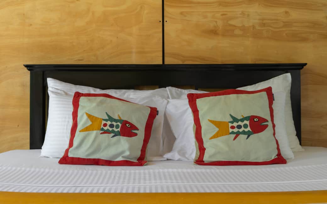 Where you sleep, with hand-stitched fish cushions made by a local artisan