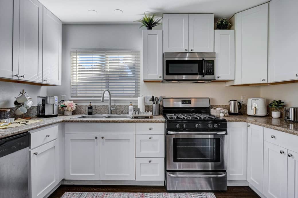 Kitchen with everything you need. Such as pots, pans, plates, utensils etc.