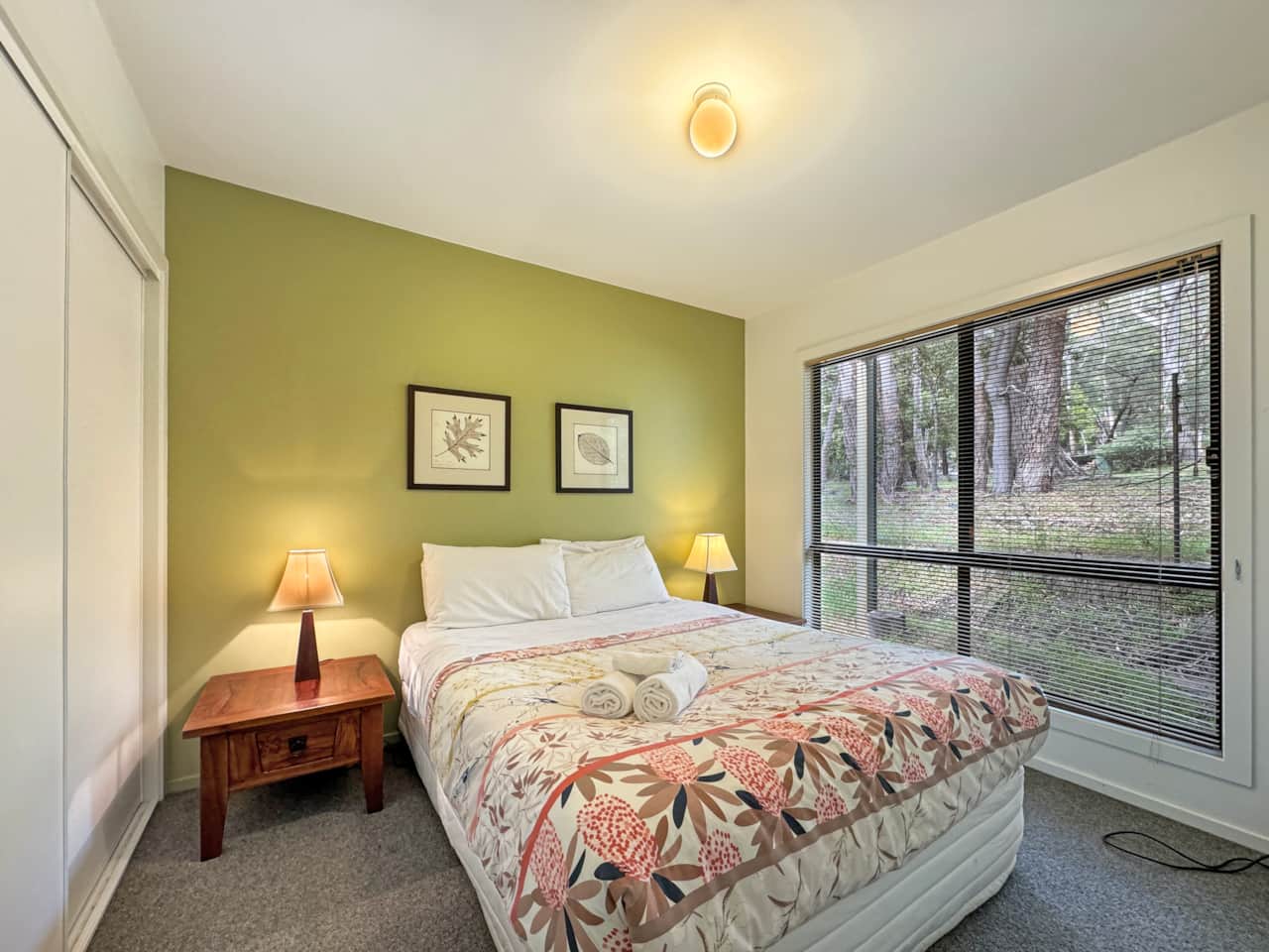 Bedroom 2 features a comfortable queen-sized bed.