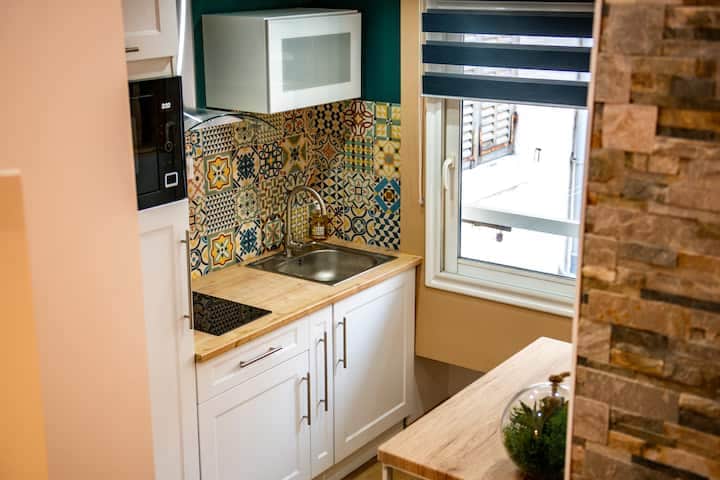 kitchen, microwave, coffee maker, kettle, stovetop