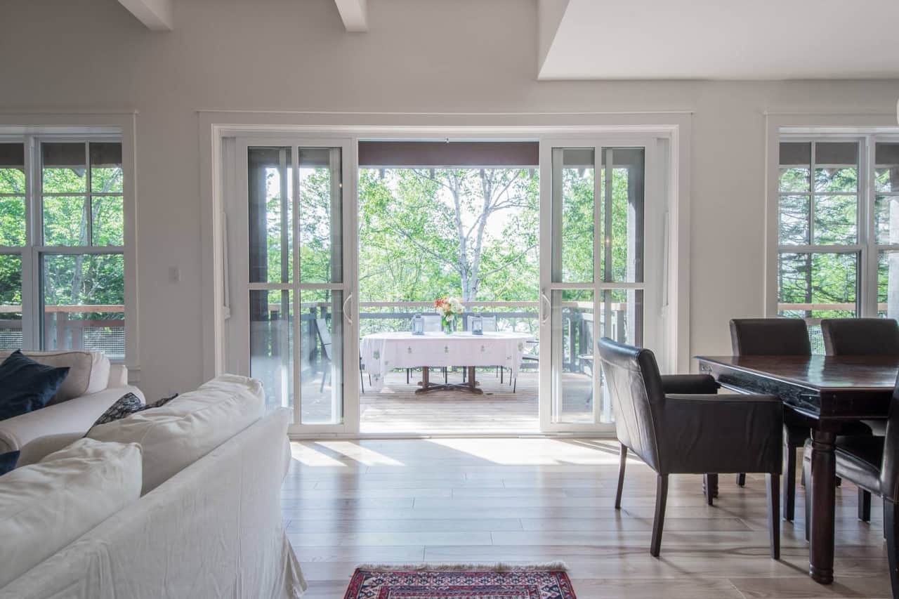 This is what you see when you enter the house.  The deck draws you to the outside and you can choose whether you will eat inside or outside.  