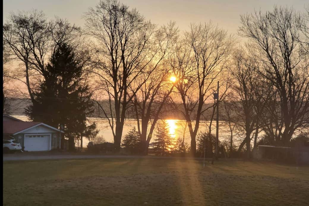Backyard lakefront sunset view Backyard lakefront sunset view