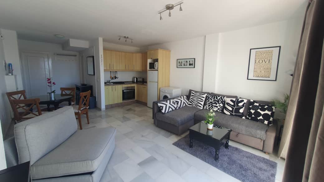 Sala de estar con cocina abierta Sala de estar con cocina abierta