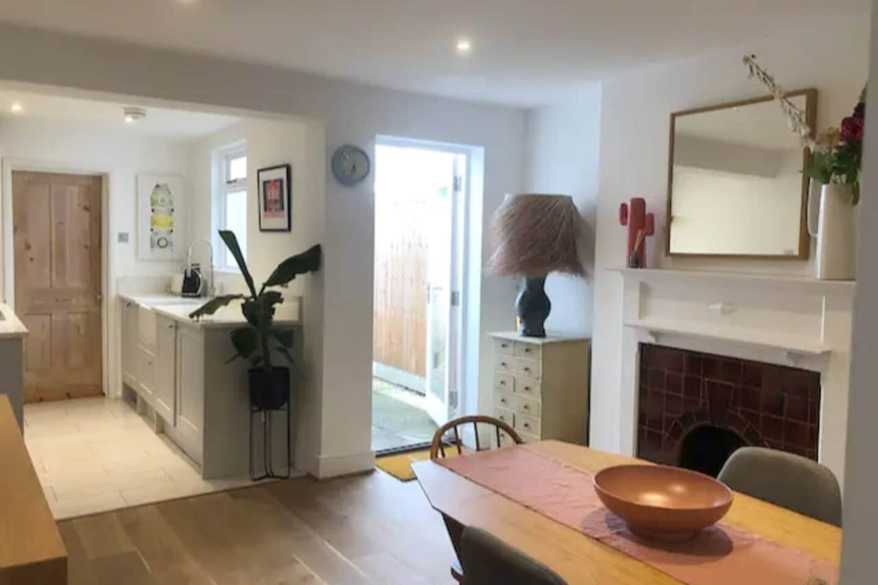 Dining Room leading to kitchen area. Dining has seating for 4 people. 
