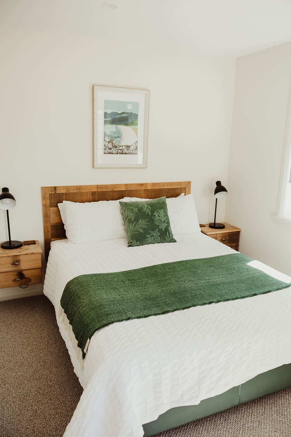 Spacious bedroom with wardrobes for storage and country views