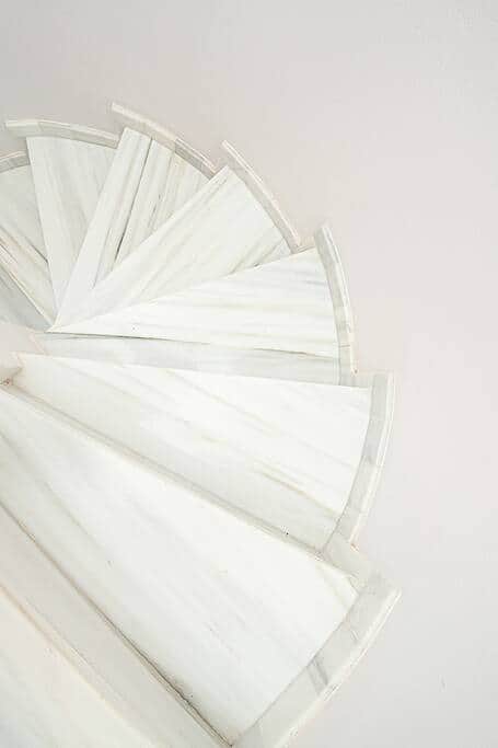 Elegant spiral staircase connecting the floors