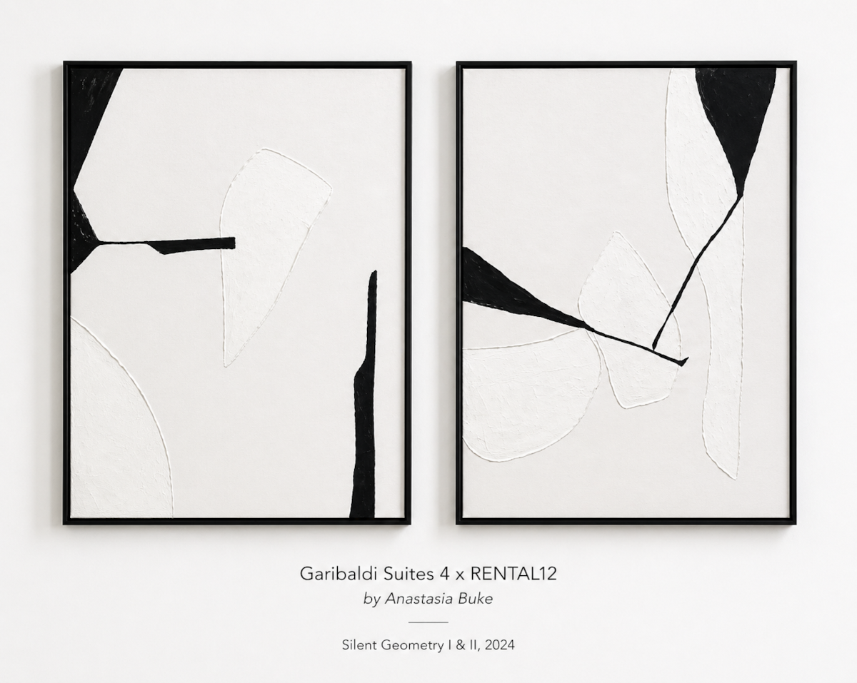 Silent Geometry Duo by Anastasia Duke — two framed panels on white wall at Garibaldi Suites #4, Olbia, Sardinia