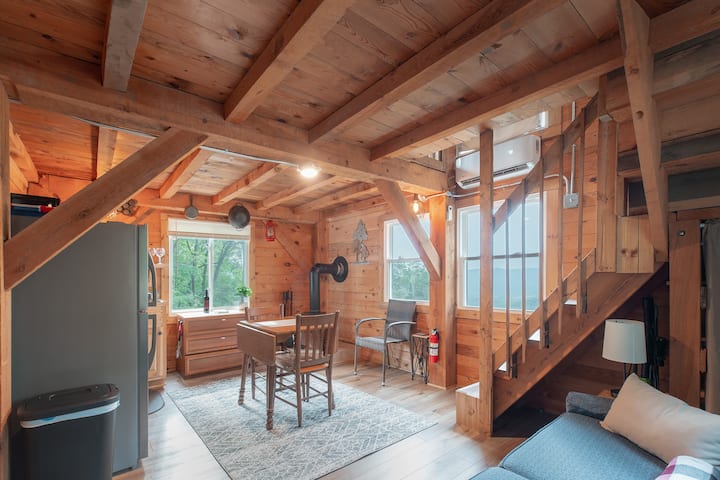 Morning coffee with a mountain view? It's a daily ritual in this tiny cabin. 