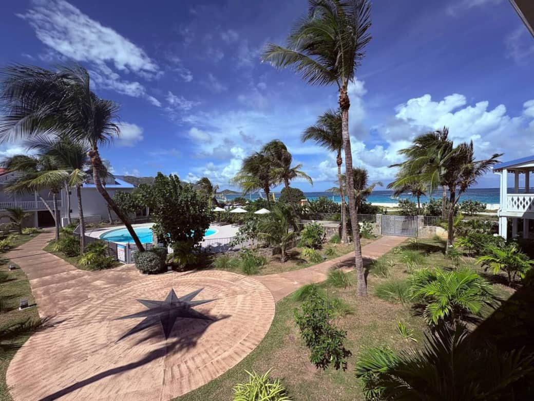 Terrace view of the pool and beach Allamanda 106