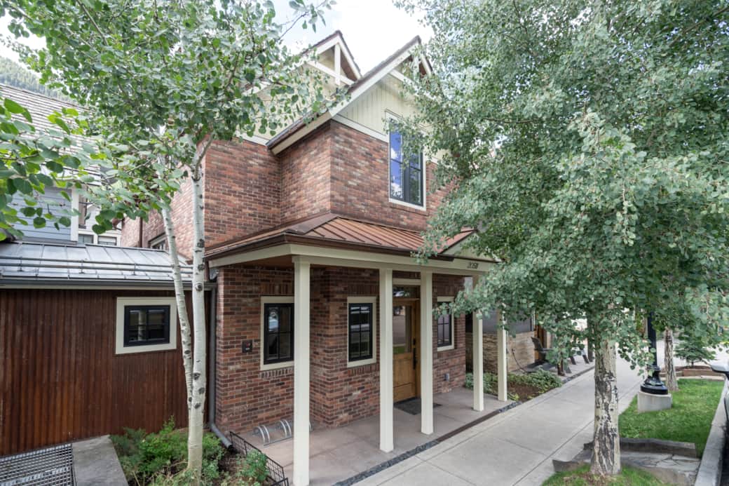 Exterior of South Oak Retreat facing W Pacific Street - enjoy both privacy and convenience!