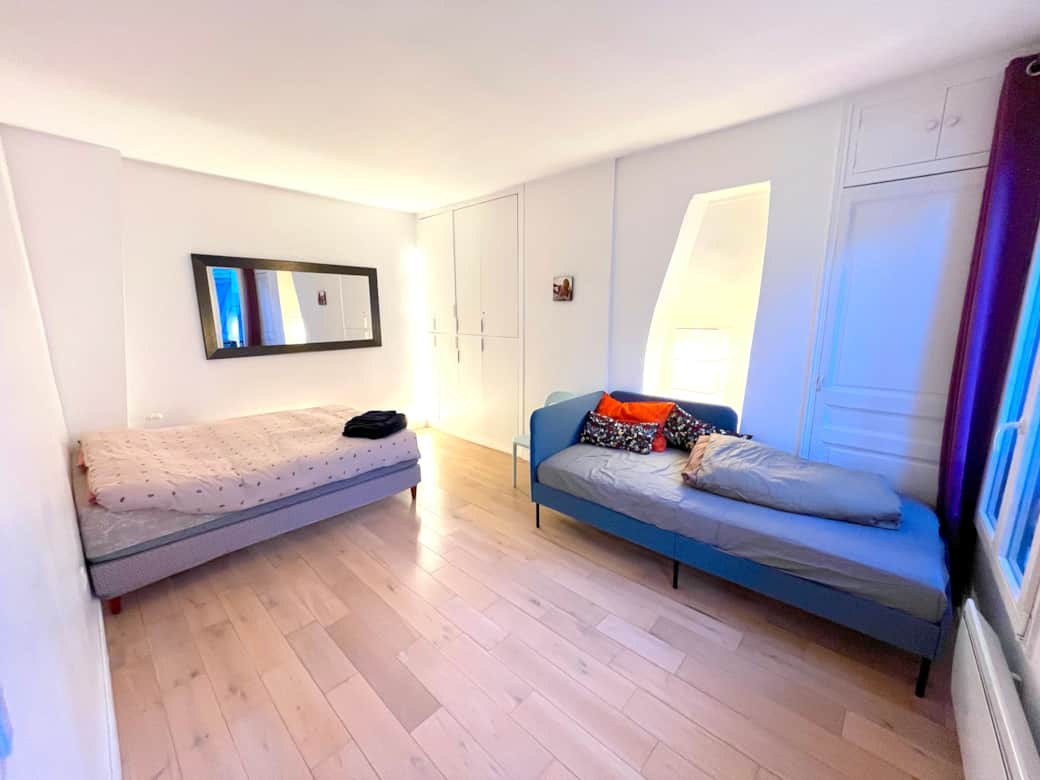 Bedroom with a double bed and 1 single bed