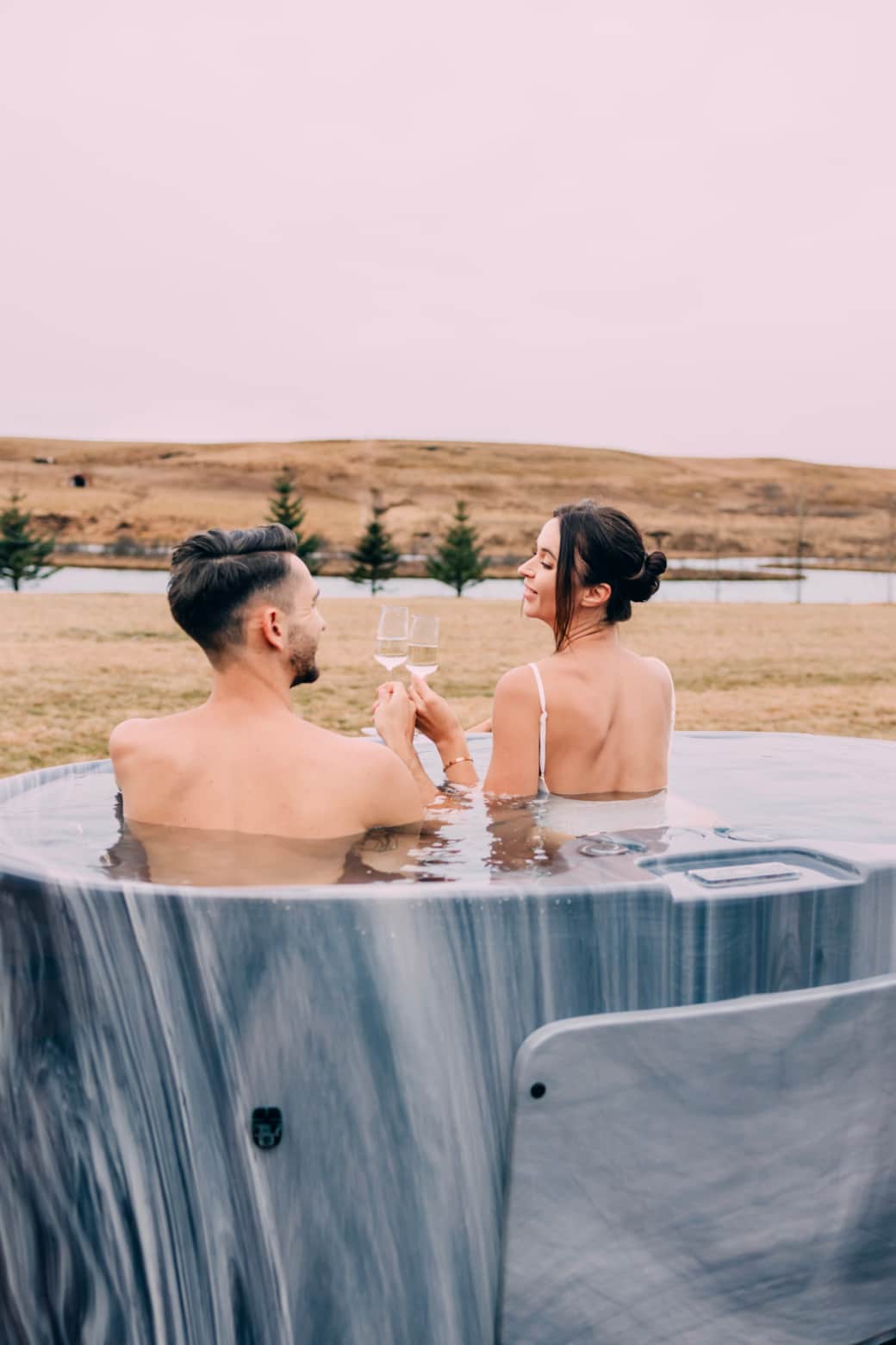 After a day of Icelandic adventure, Cozy up by the firepit with a glass of wine or dip in the hot tu After a day of Icelandic adventure, Cozy up by the firepit with a glass of wine or dip in the hot tu