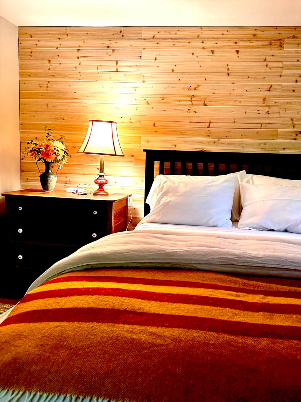 The Pine Cone Cabin Bedroom - Cedar Walld and Wool Camp Blanket
