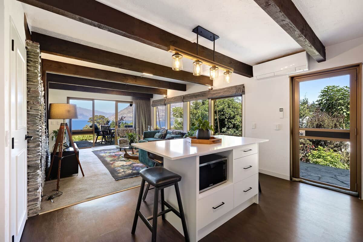 Open plan living and dining area at Walk to Town 39A Alpine Chalet Lomond Crescent Queenstown