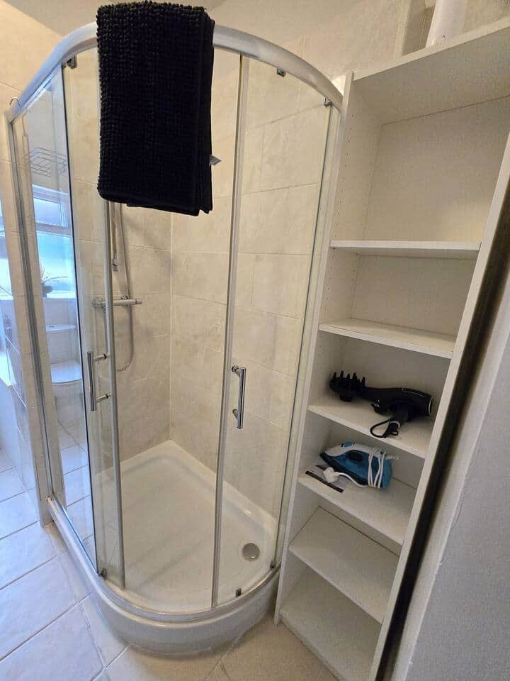 A three piece bathroom has a good pressure shower only, no bath A three piece bathroom has a good pressure shower only, no bath