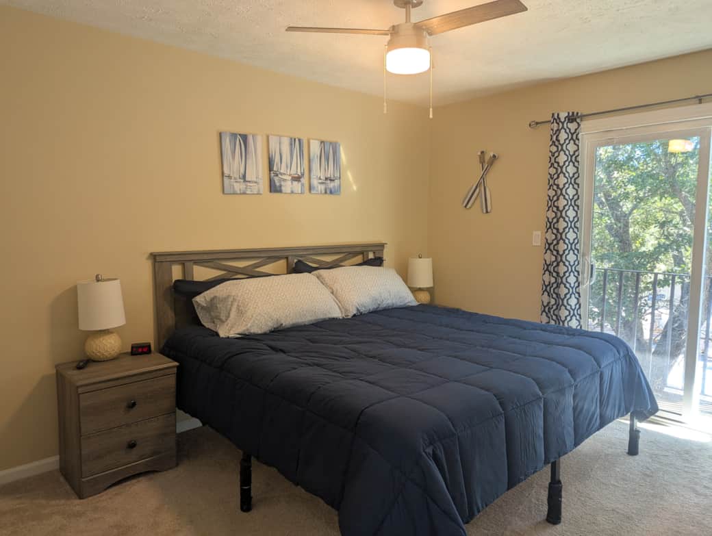 Bedroom with a king bed and private balcony