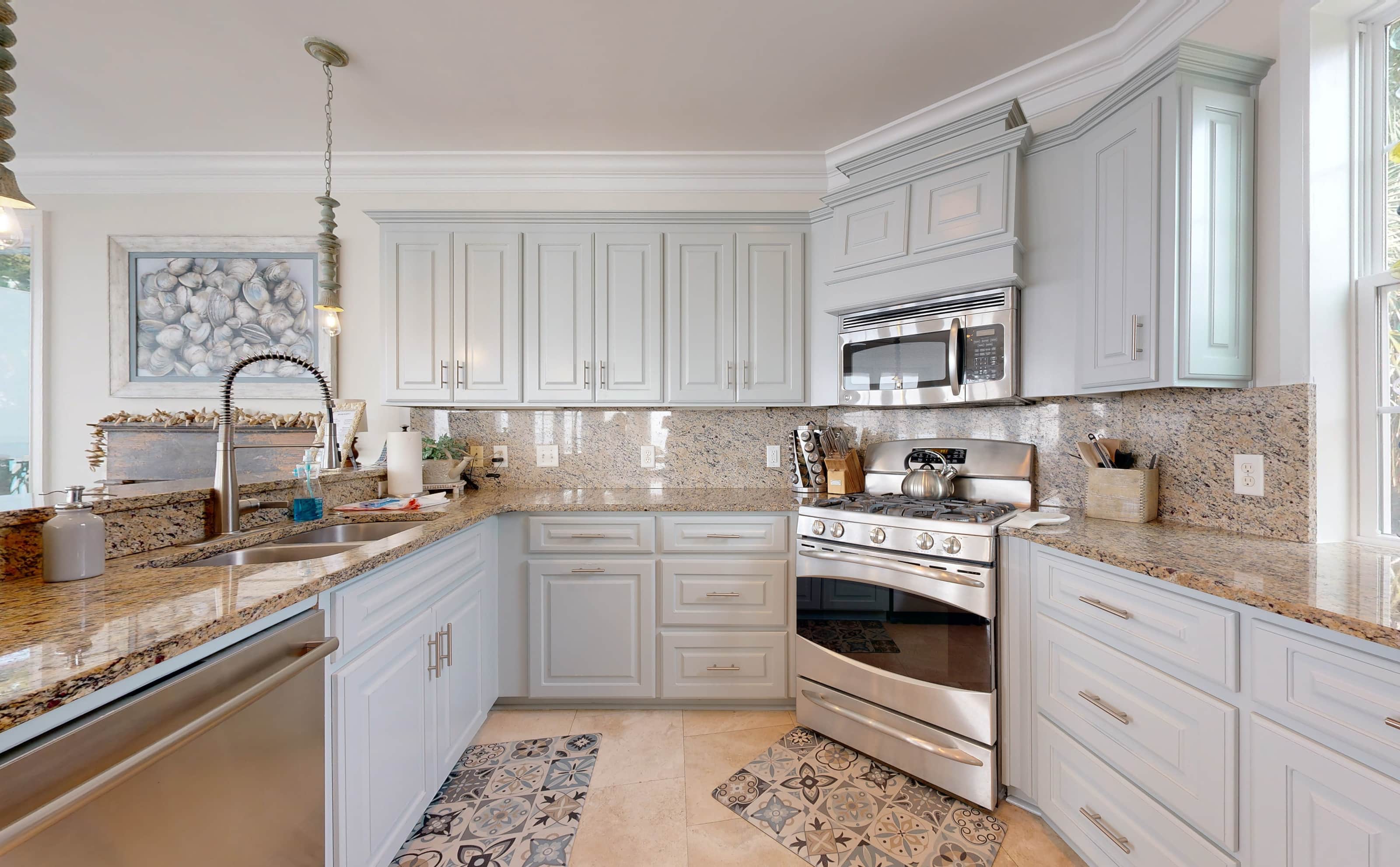Full kitchen with gas burner stovetop