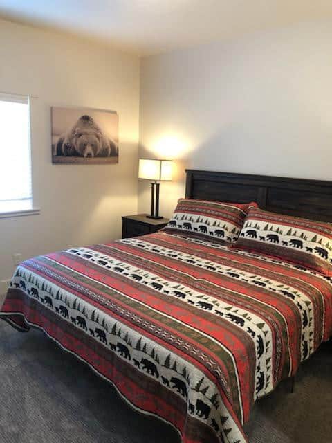 Bedroom 1, deluxe king bed