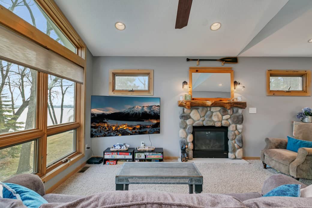 Living room with fireplace and 65" Smart TV Living room with fireplace and 65" Smart TV