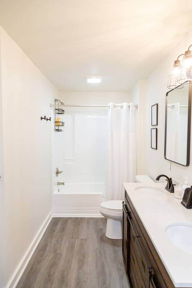 Sage Green Getaway - Sizeable bathroom includes double vanity, toilet and tub/shower combo. Sage Green Getaway - Sizeable bathroom includes double vanity, toilet and tub/shower combo.