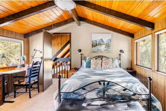 Upstairs bedroom features a queen bed and 100% cotton sheets.