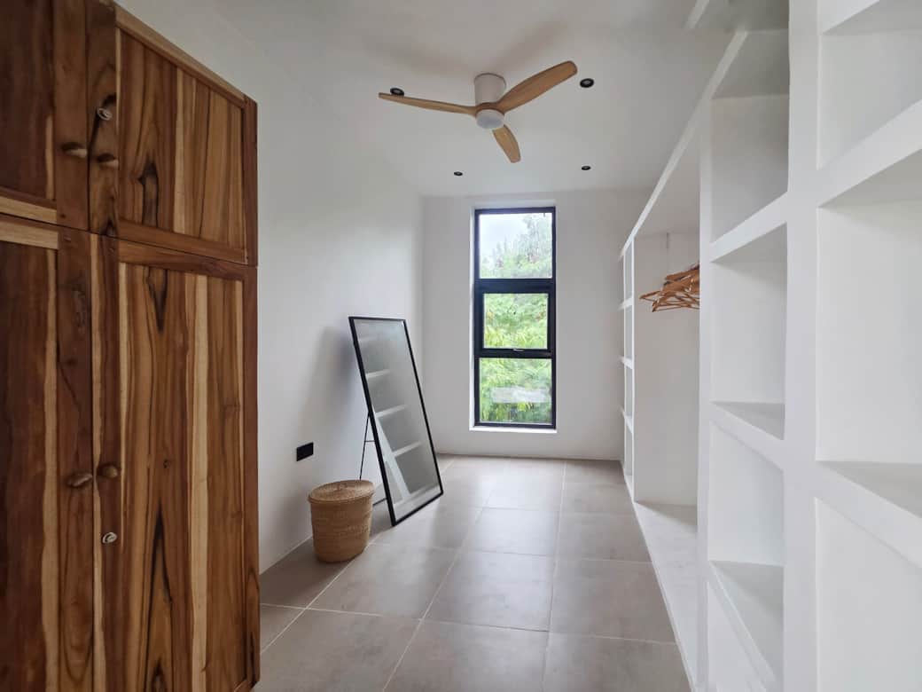 Bright master bedroom with ensuite bathroom and walk-in closet