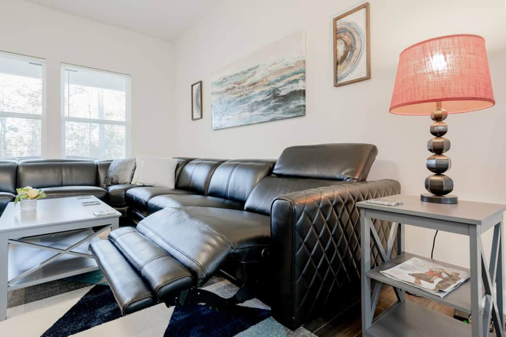 Power recliner control located on side cushion