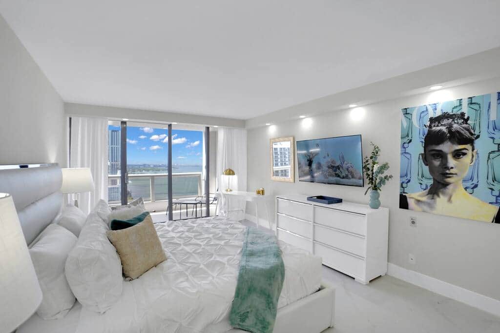 Master bedroom, king bed, desk, Roku tv, balcony access, bathroom