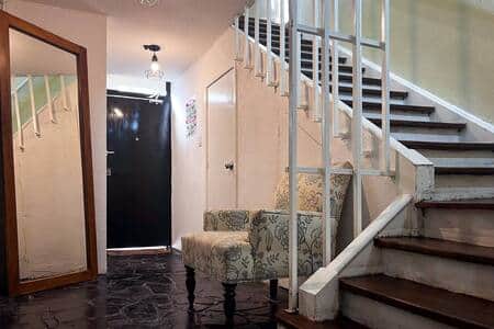 Main Corridor: Spacious hallway connecting rooms and shared spaces for easy access. Main Corridor: Spacious hallway connecting rooms and shared spaces for easy access.