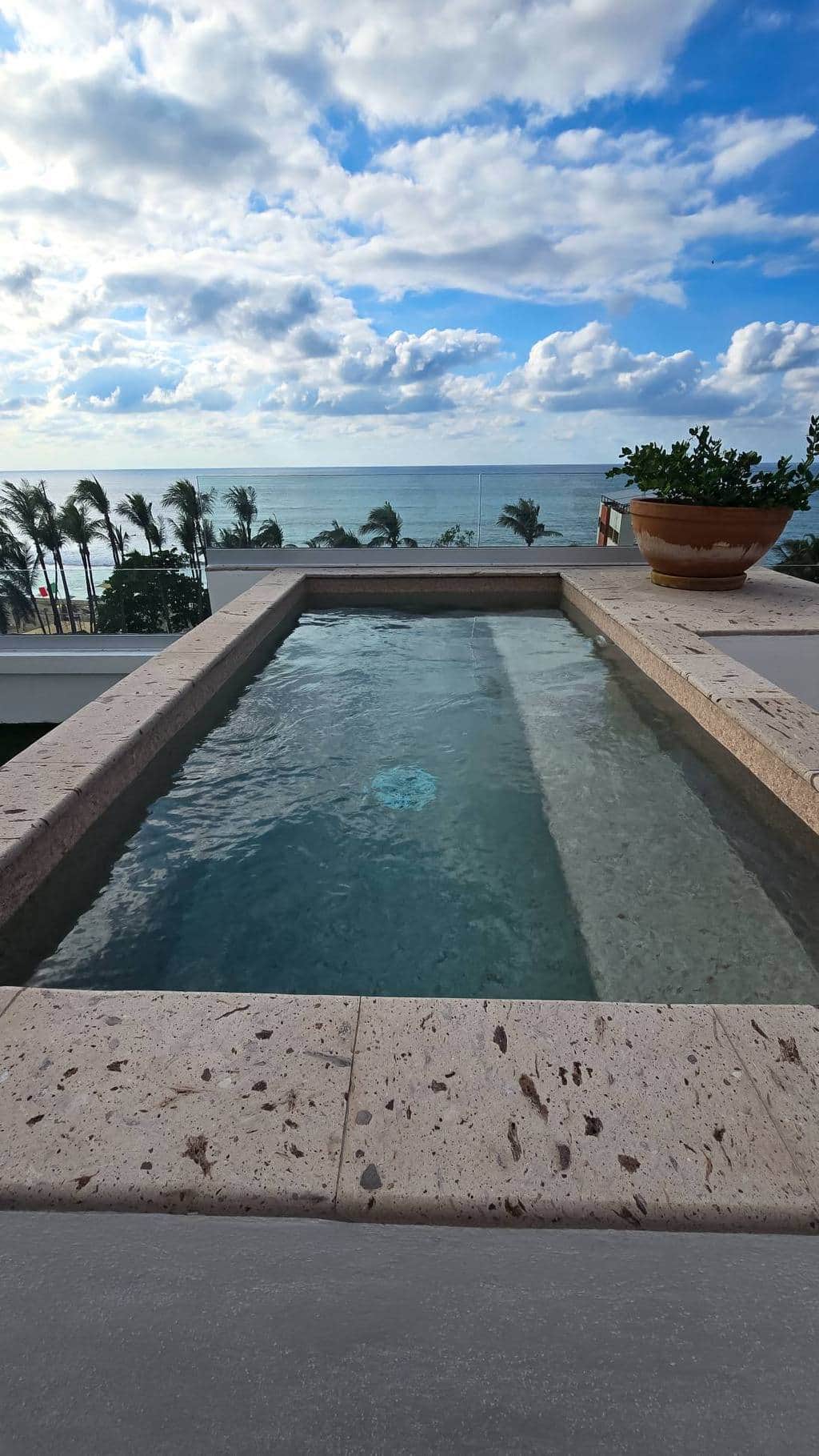 Private rooftop plunge pool with endless Pacific views and warm coastal sun. Private rooftop plunge pool with endless Pacific views and warm coastal sun.