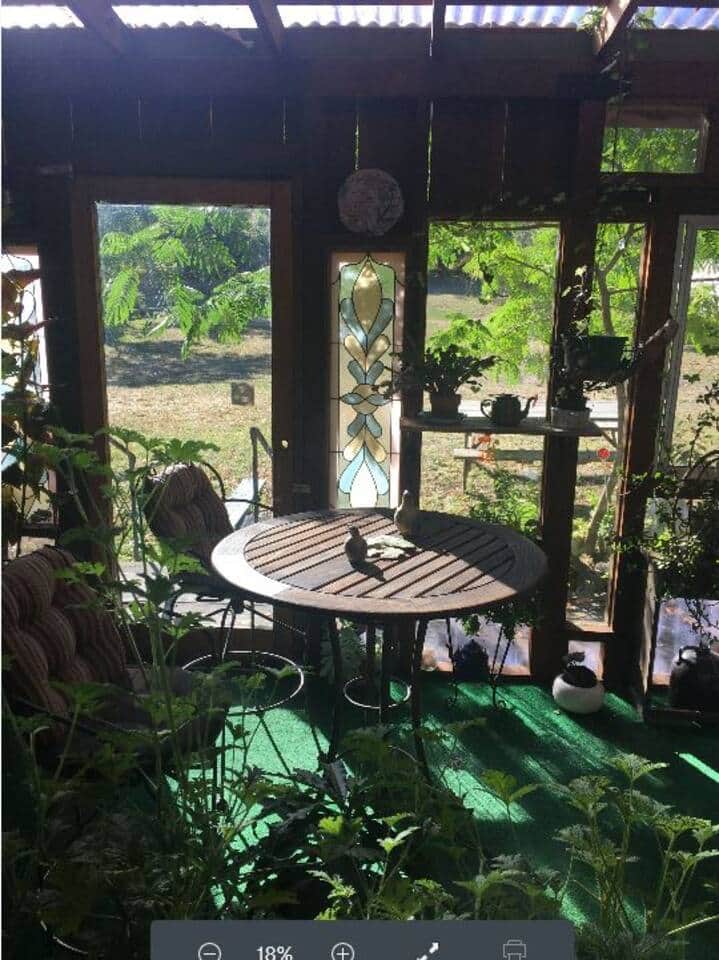 The sunroom through the bedroom window