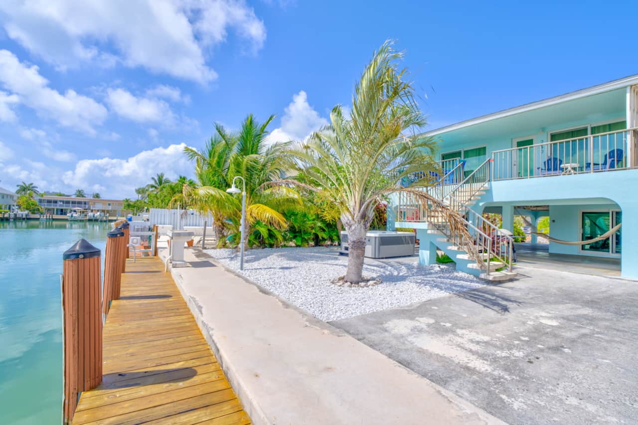 Your own 37.5 ft of deep-water dockage on a 100 ft wide canal, with the hot tub steps away. Guests s