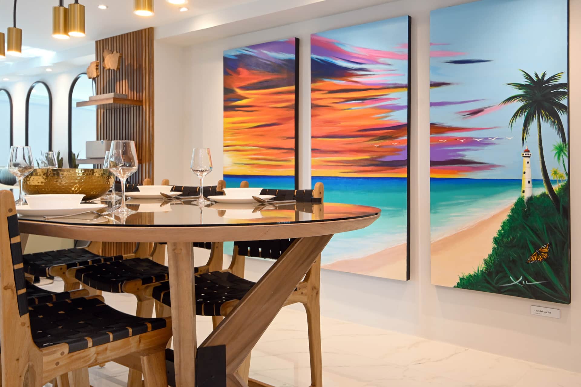 Casa Graciela Pequeña dining room with commissioned Mexican artwork and handcrafted furnishings in Cozumel