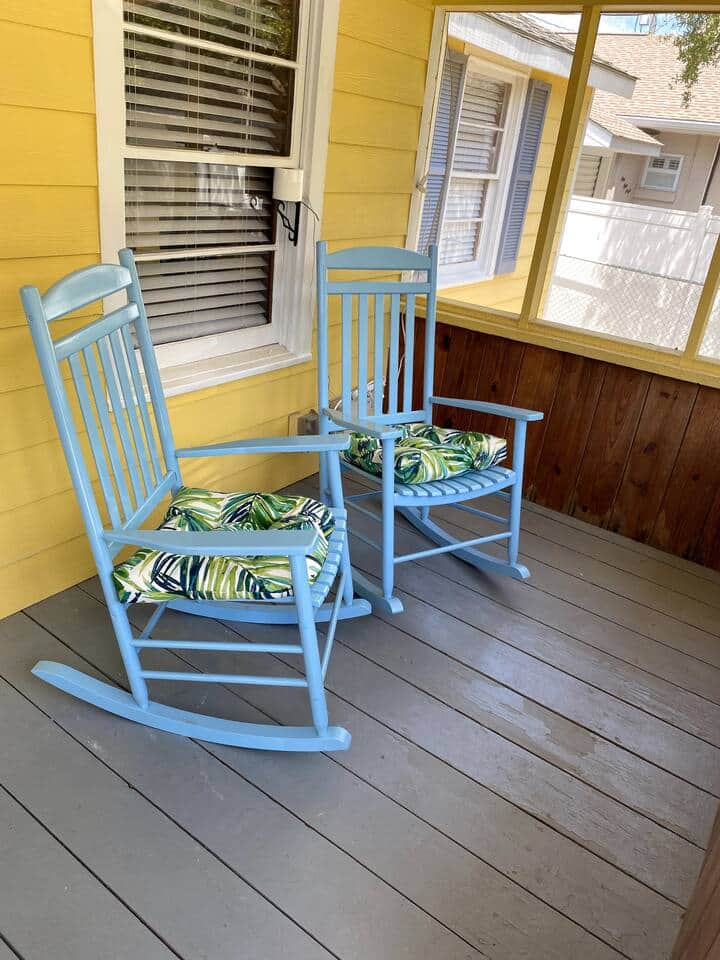 Screened front porch with rocking chairs to relax