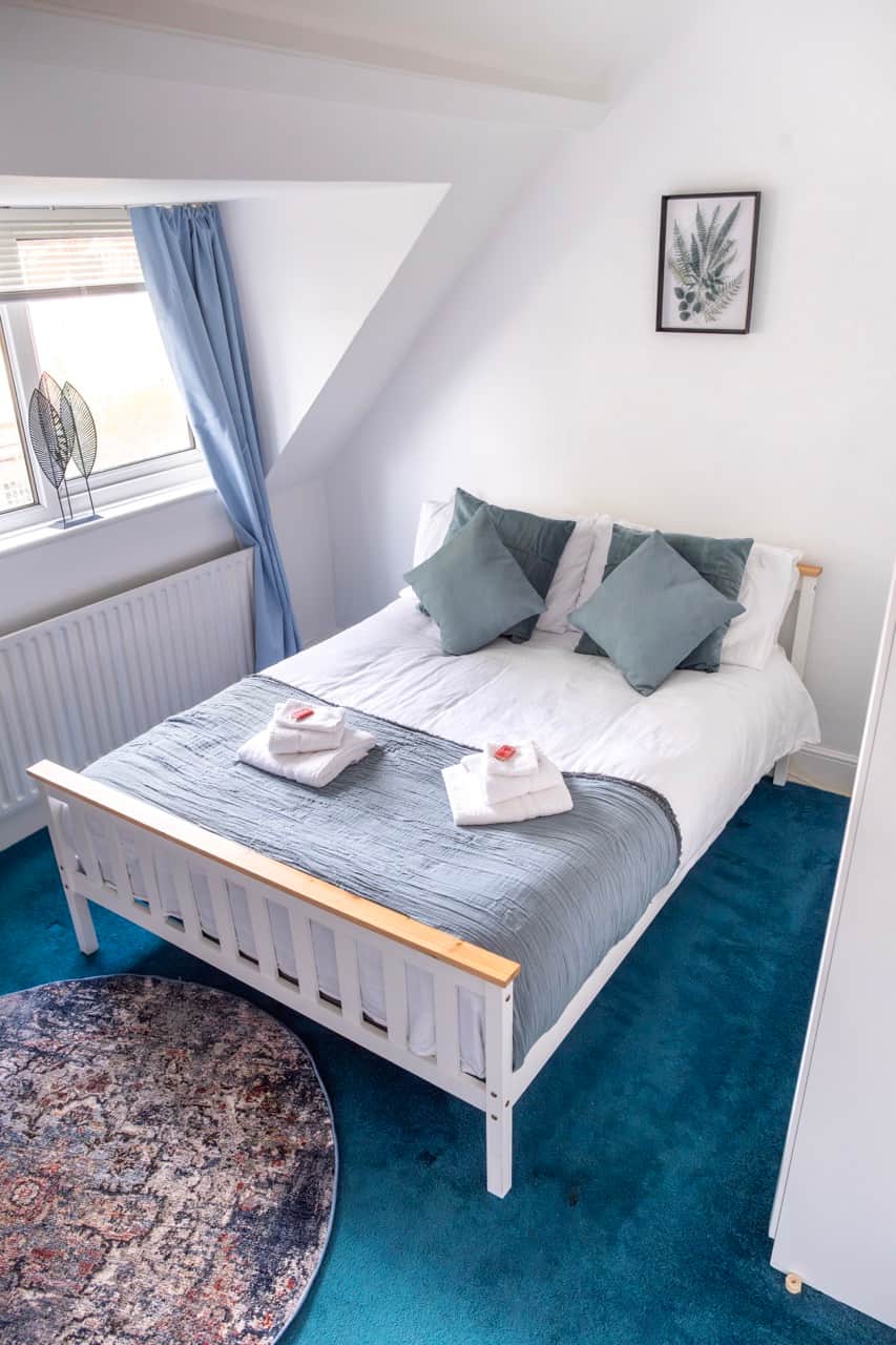 Bright and stylish double bedroom featuring a comfortable bed, fresh hotel-quality linen, Bright and stylish double bedroom featuring a comfortable bed, fresh hotel-quality linen,