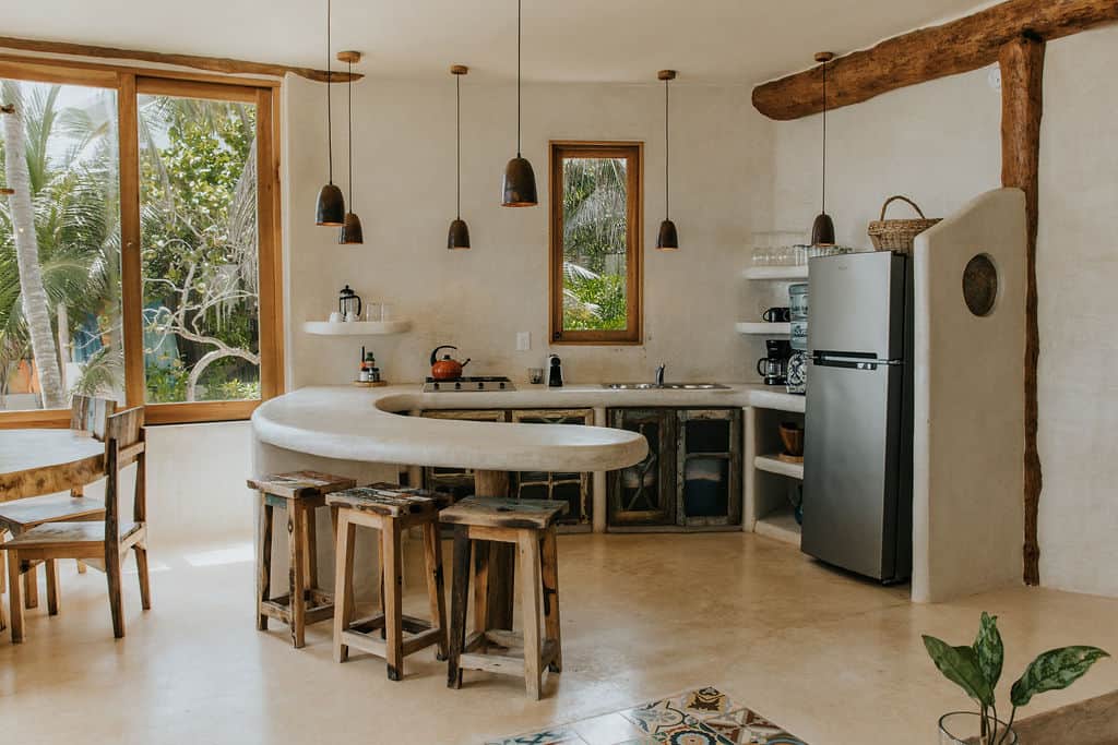 Kitchen with gas stove top and cooking supplies
