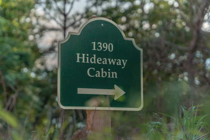Your path to mountain bliss. Our sign helps navigate the last turn to relaxation.