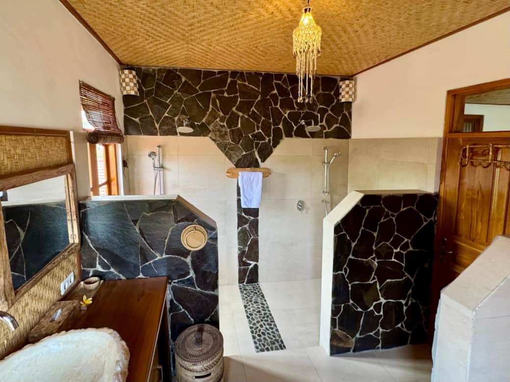 Bathroom with his and hers shower